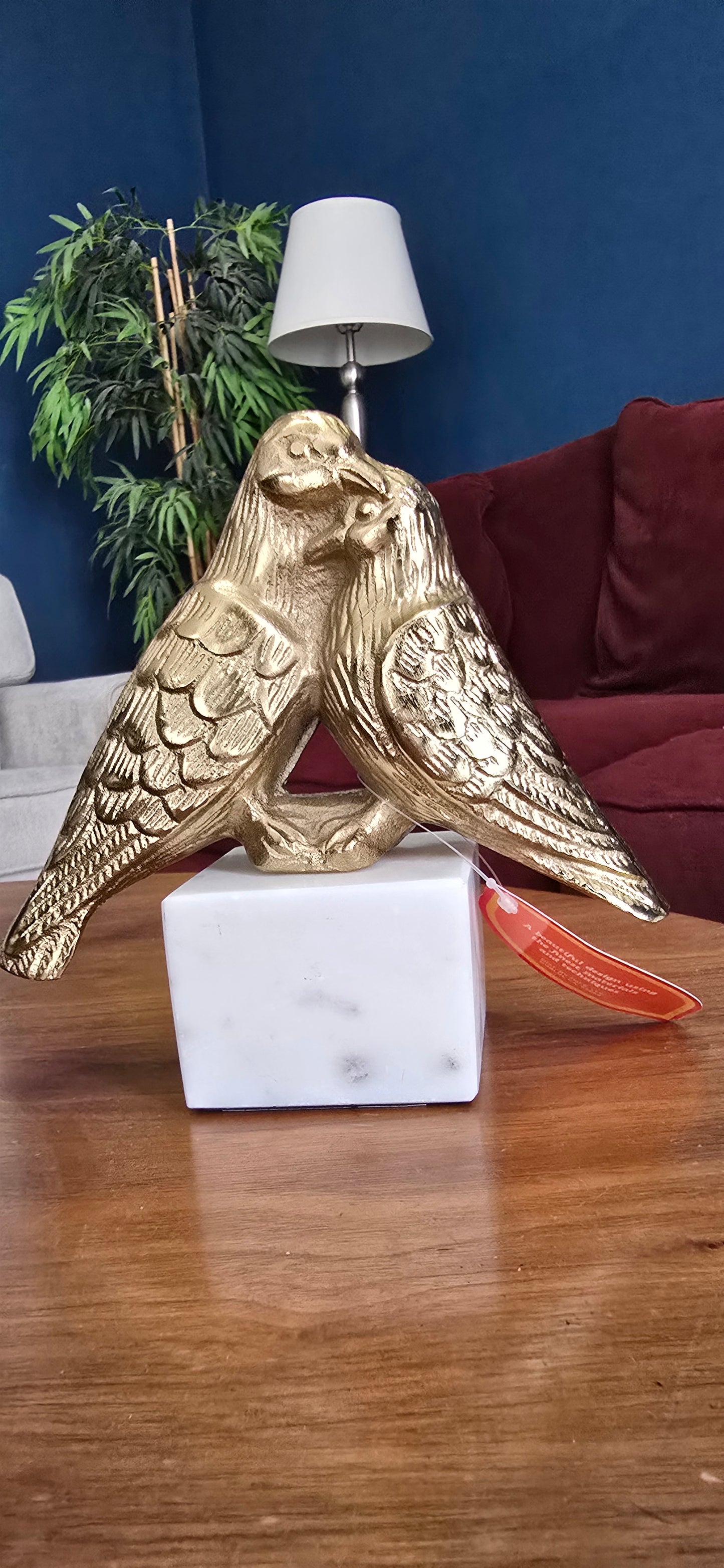 ADORNO DORADO DE PAREJITA DE AVES
